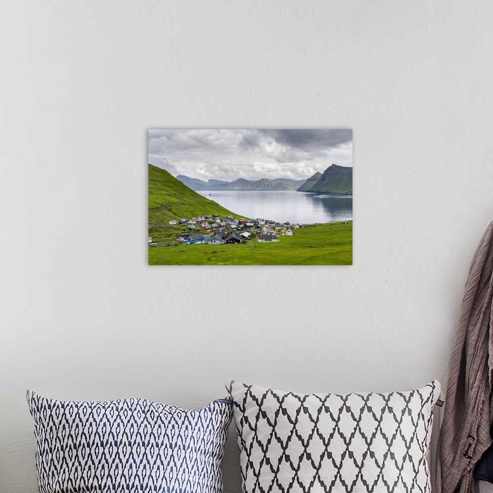 A bohemian room featuring Village Funningur , in the background Funningsfjordur, Leiriksfjordur and the island Kalsoy. The ...