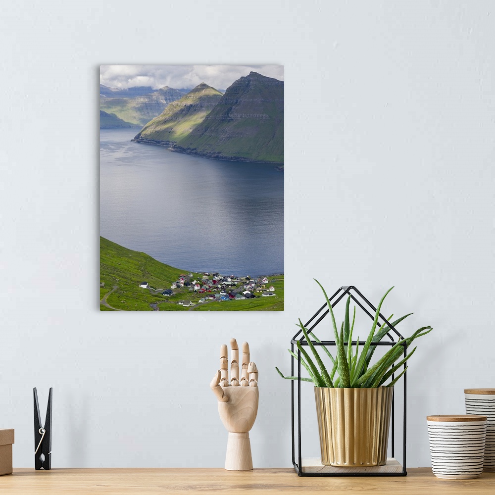 A bohemian room featuring Village Funningur , in the background Funningsfjordur, Leiriksfjordur and the island Kalsoy. The ...