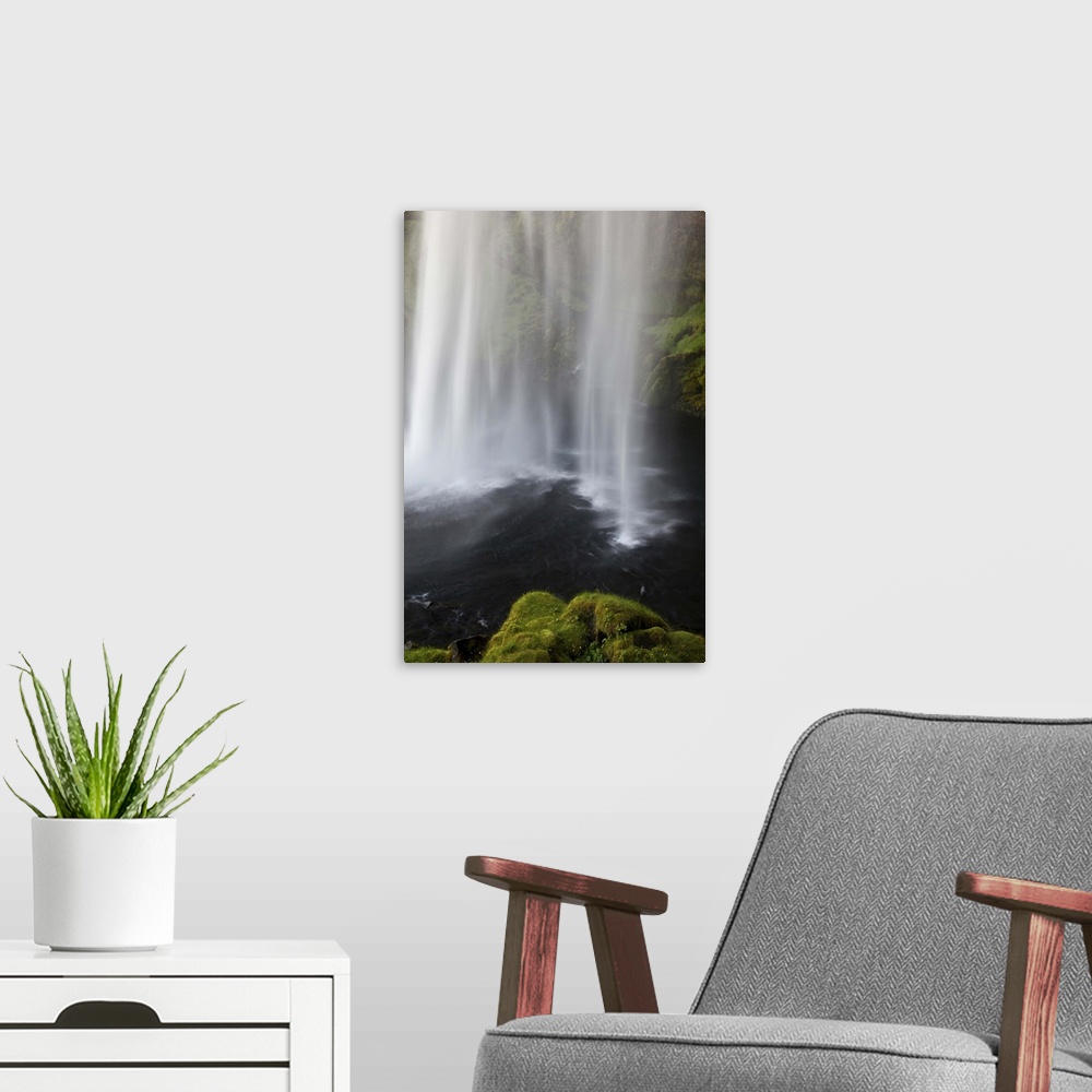 A modern room featuring Falling water, Seljalandsfoss Waterfall, Iceland