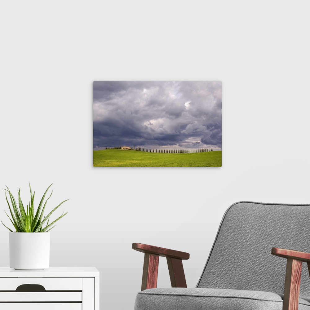 A modern room featuring Italy, Tuscany, Val d'Orcia. Farmhouse and storm clouds at sunset. Credit: Jim Nilsen