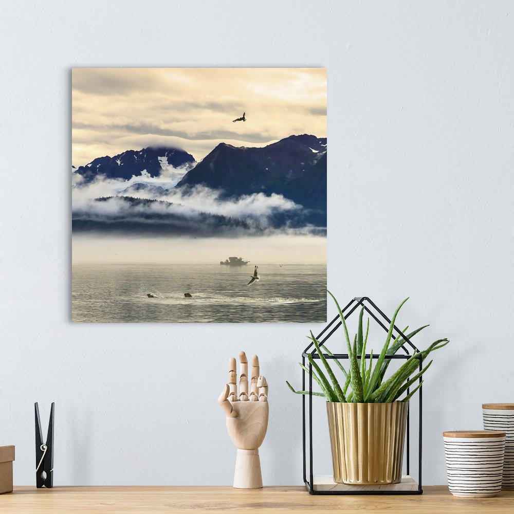 A bohemian room featuring Fishing Boat In Kenai Peninsula Surrounded By Mountains And Wildlife