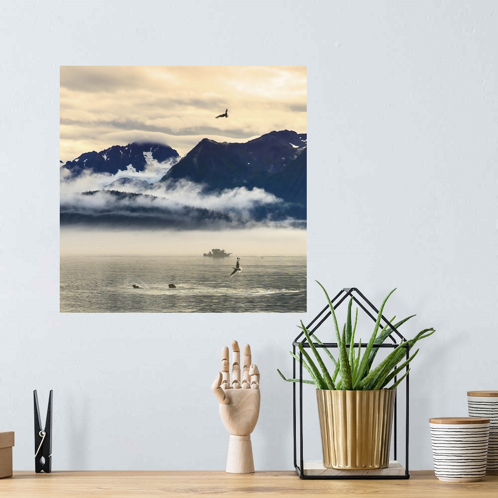 A bohemian room featuring Fishing Boat In Kenai Peninsula Surrounded By Mountains And Wildlife