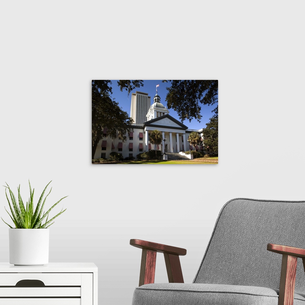 A modern room featuring USA, Florida, Tallahassee, old and new State Capitol buildings