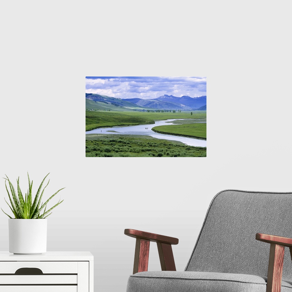 A modern room featuring Fly fishing in the Lamar River in Yellowstone National Park.