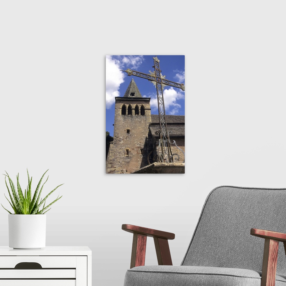 A modern room featuring France: Averyon, Bozouls, Eglise Ste Fauste, Romanesque 12th century, steeple and bell tower behi...