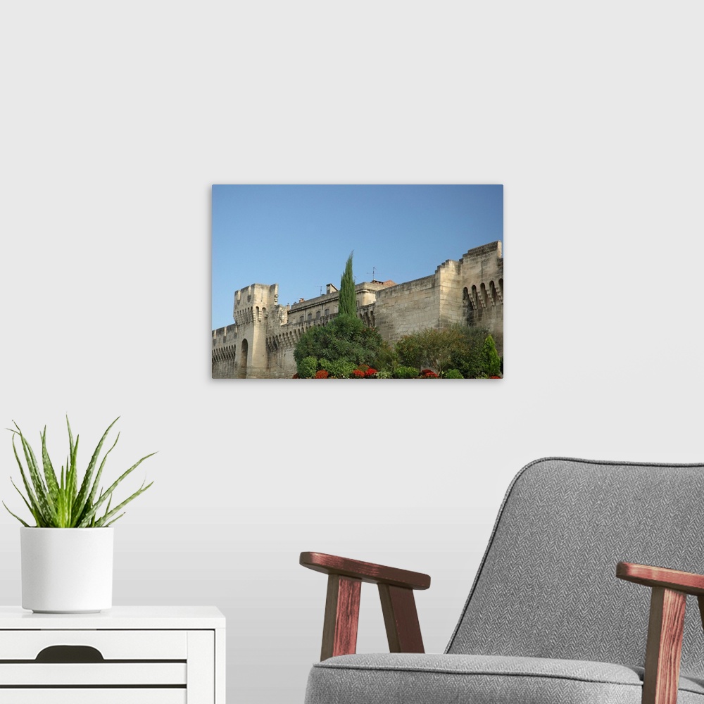 A modern room featuring France, Avignon, Provence, ramparts surrounding city