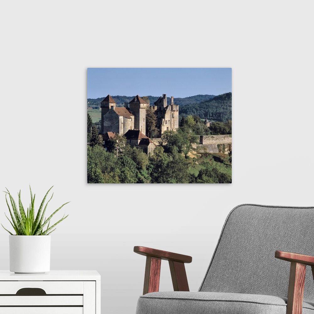 A modern room featuring Europe, France, Curemonte. The towers of Curemonte Castle catch the late afternoon light in the L...