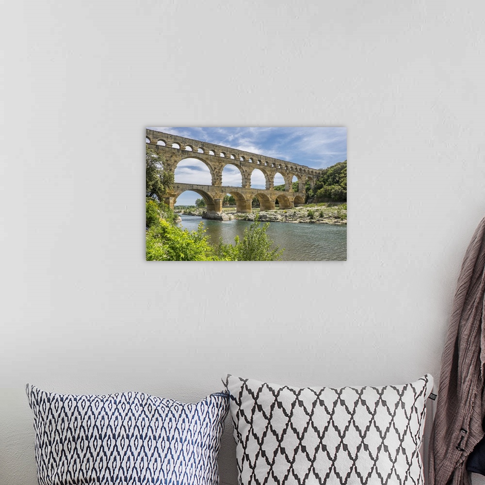 A bohemian room featuring France, Nimes, the Pont du Gard is an ancient Roman aqueduct bridge that crosses the Gardon River.
