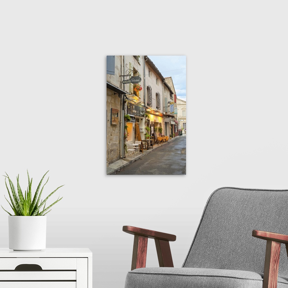 A modern room featuring France, Provence, St. Remy-de-Provence. Shops and restaurants line the street. Credit as: Fred Lo...