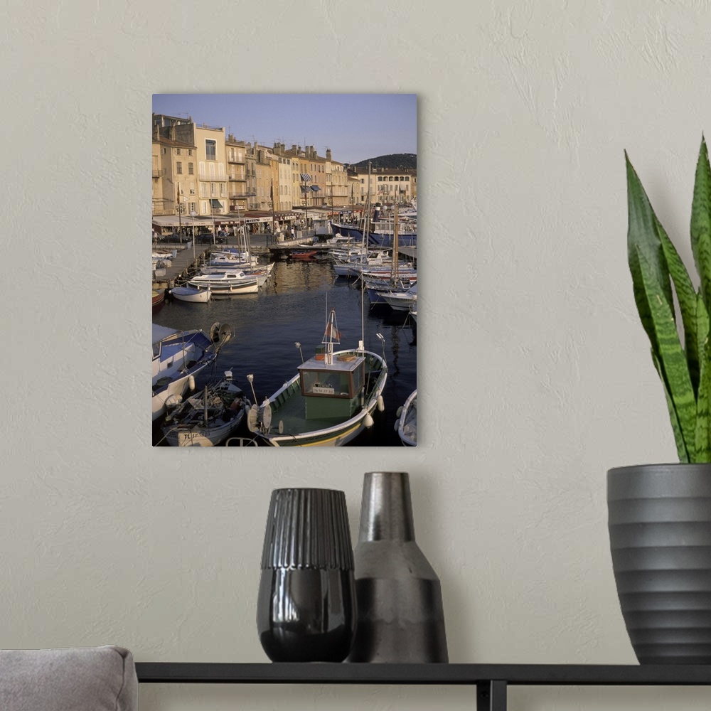 A modern room featuring Europe, France, St. Tropez.Boats moored in harbor