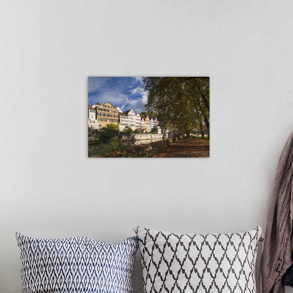 A bohemian room featuring Germany, Baden-Wurttemburg, Tubingen, old town buildings along the Neckar River.