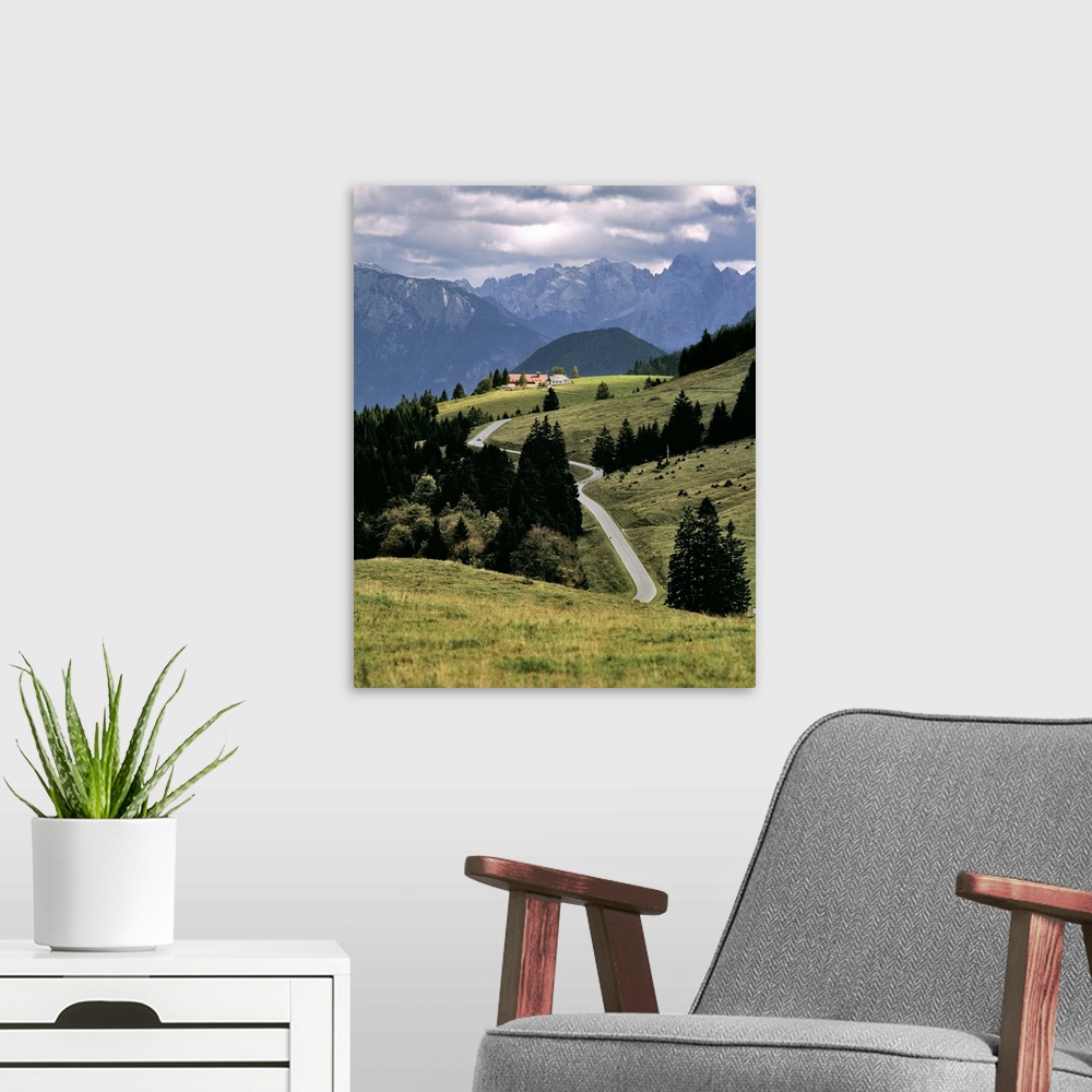 A modern room featuring Germany, Bavaria, Bayrischzell. A break in the clouds lets sunshine draw attention to this hamlet...