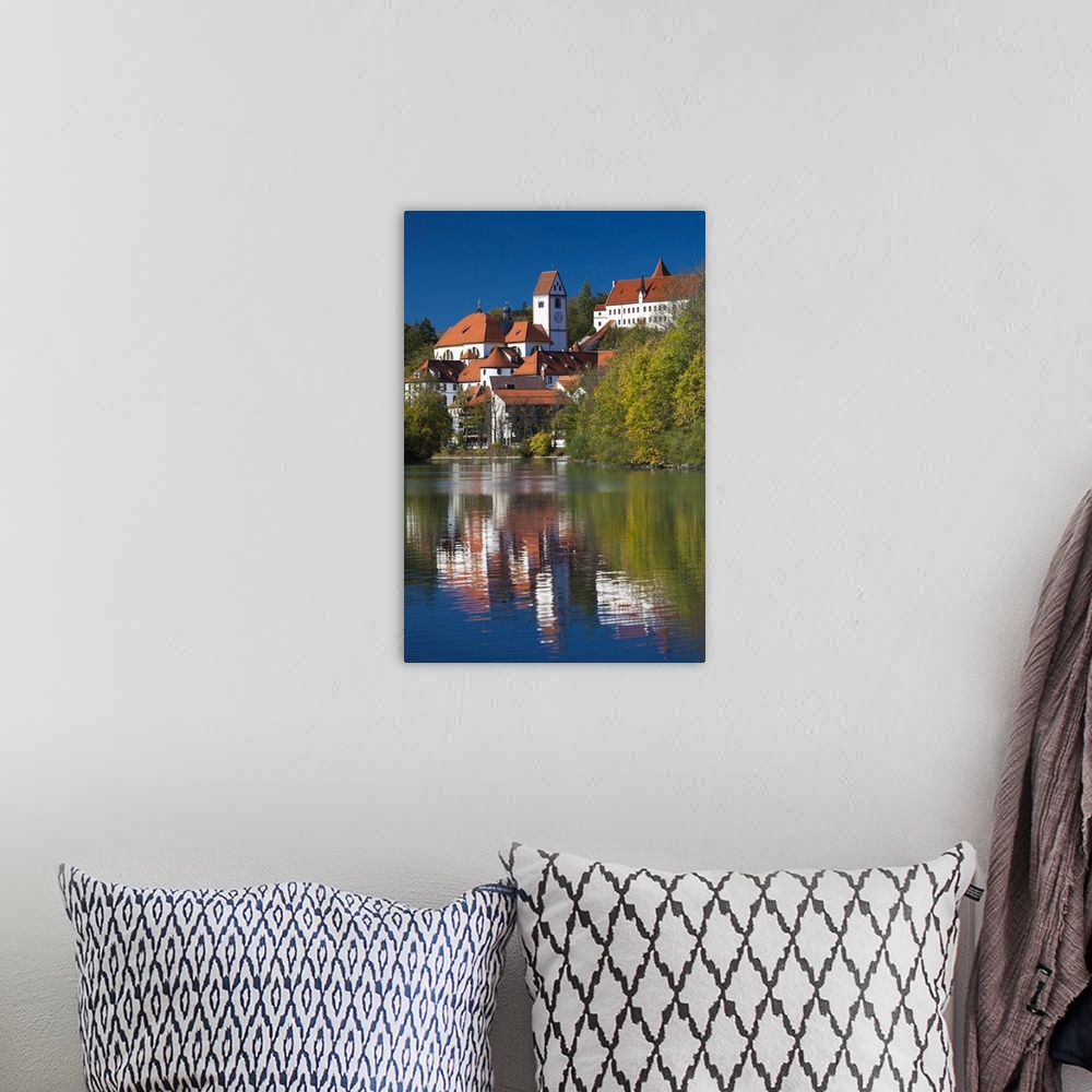 A bohemian room featuring Germany, Bavaria, Fussen, St. Mang Abbey and the Hohes Schloss Castle from the Lech River.