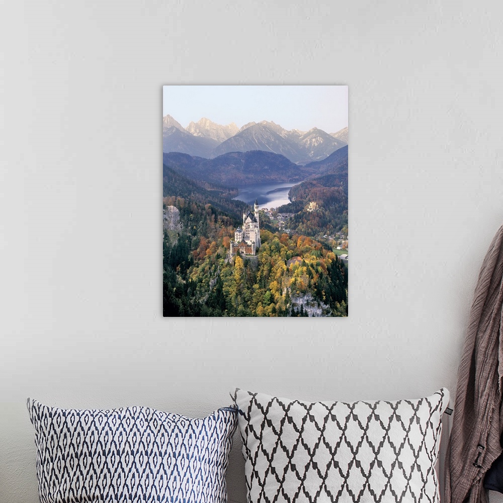 A bohemian room featuring Germany, Bavaria, Neuschwanstein Castle. Neuschwanstein Castle looms above the village and Hohens...