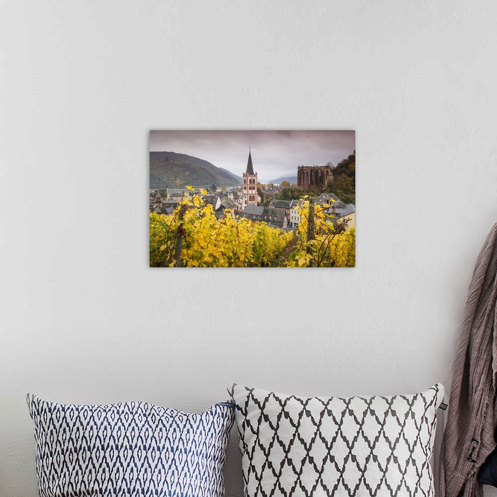 A bohemian room featuring Germany, Rhineland-Pfalz, Bacharach, elevated town view in autumn.