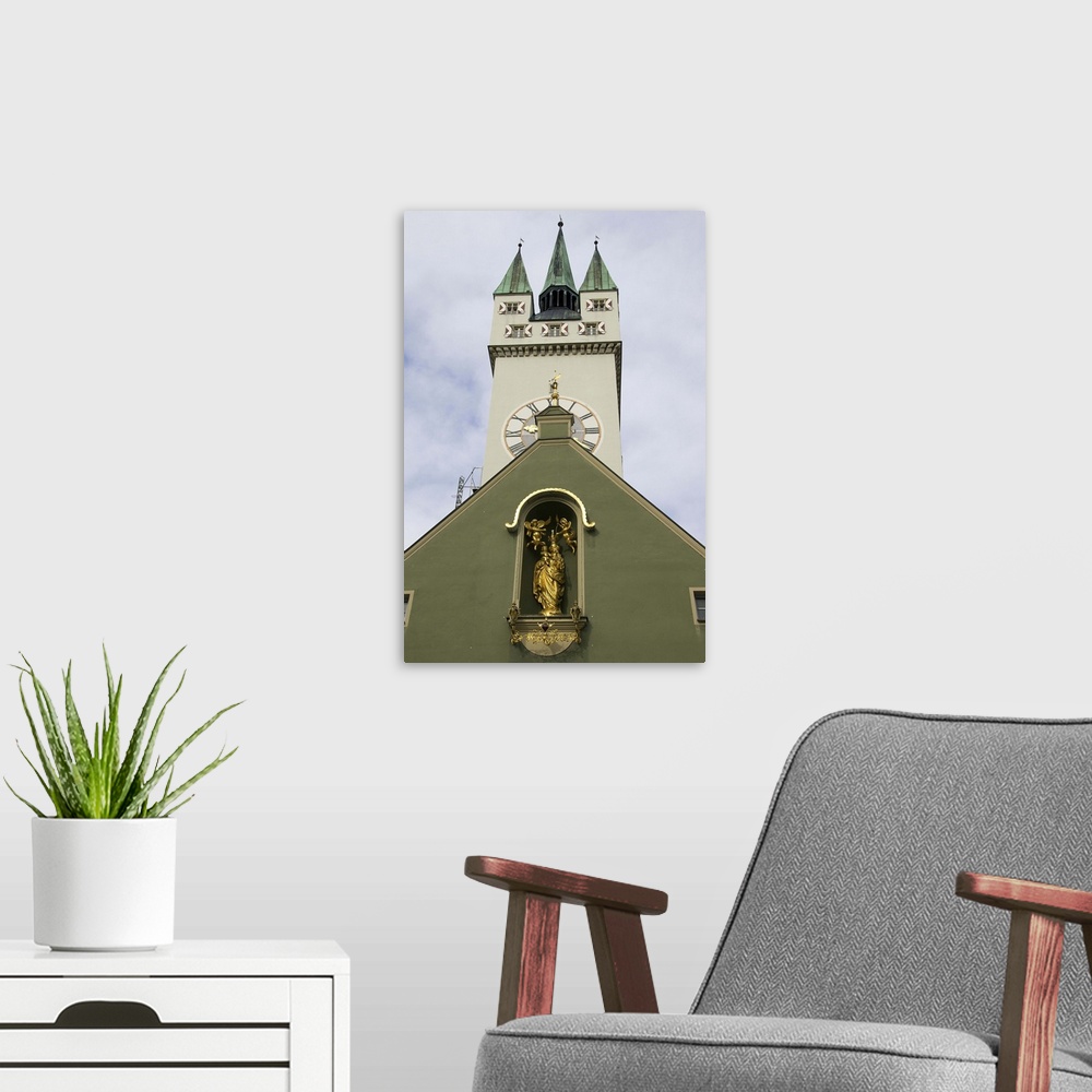 A modern room featuring Germany, Straubing, clock tower on church