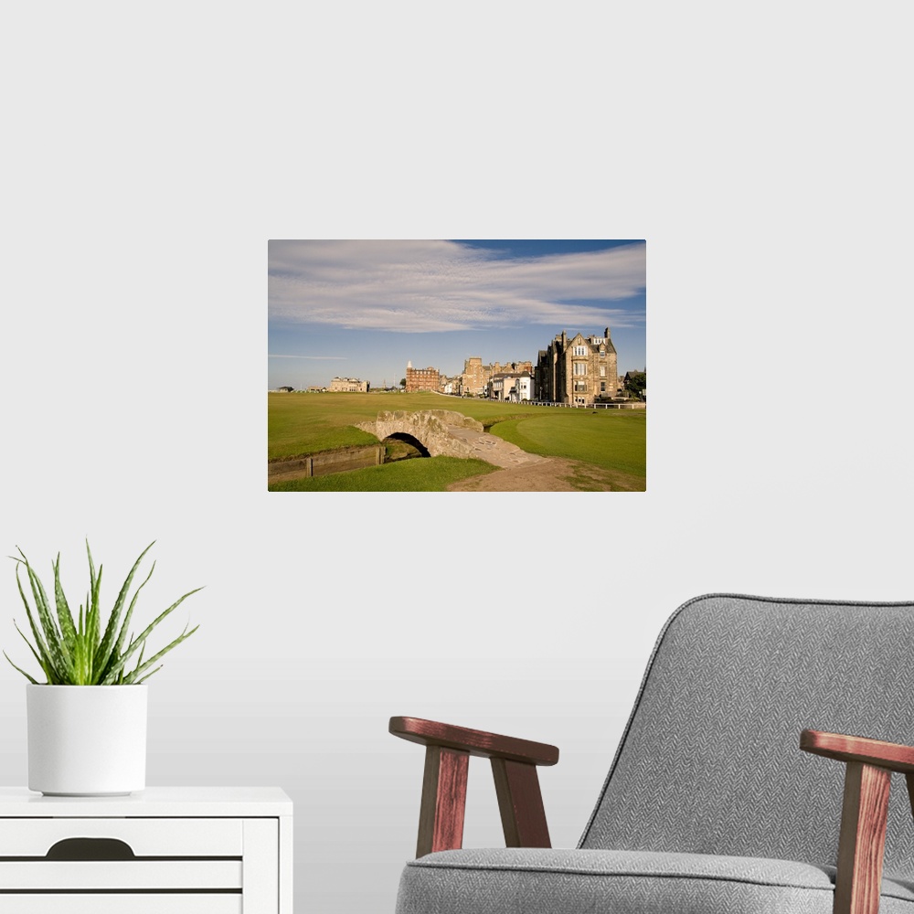 A modern room featuring Golfing the special Swilcan Bridge on the 18th hole at the world famous St Andrews Old Golf Cours...
