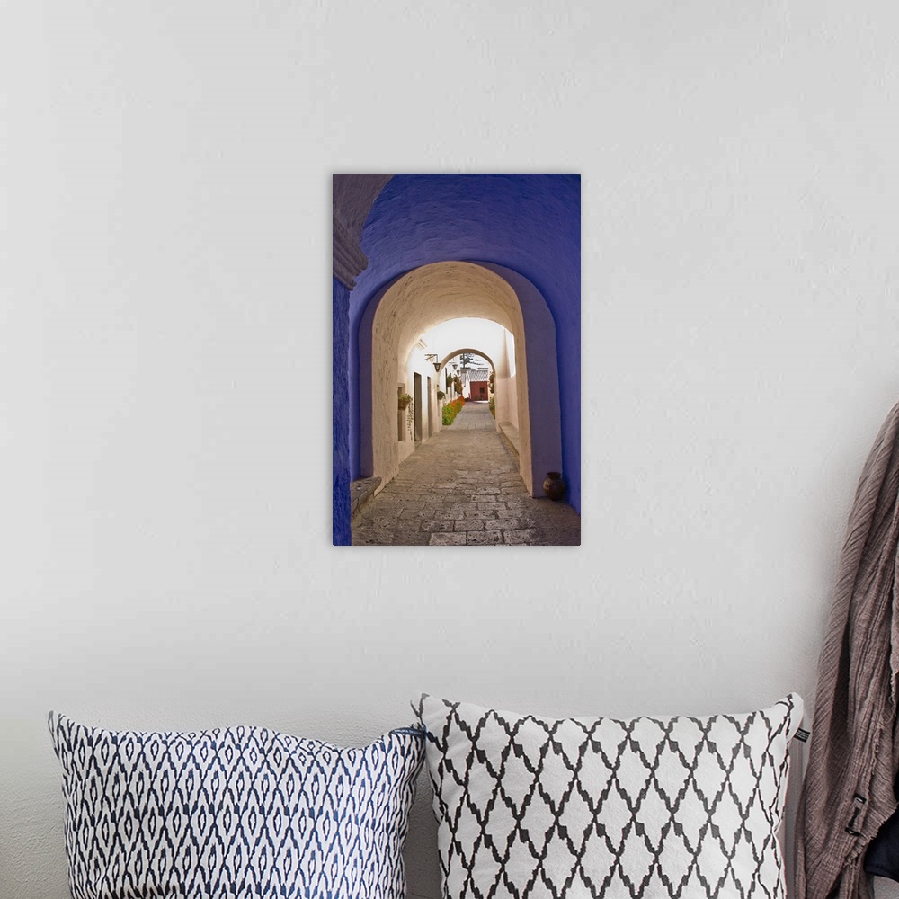A bohemian room featuring Graceful archways of Monasterio Santa Catalina in the "White City" of Arequipa, Peru.