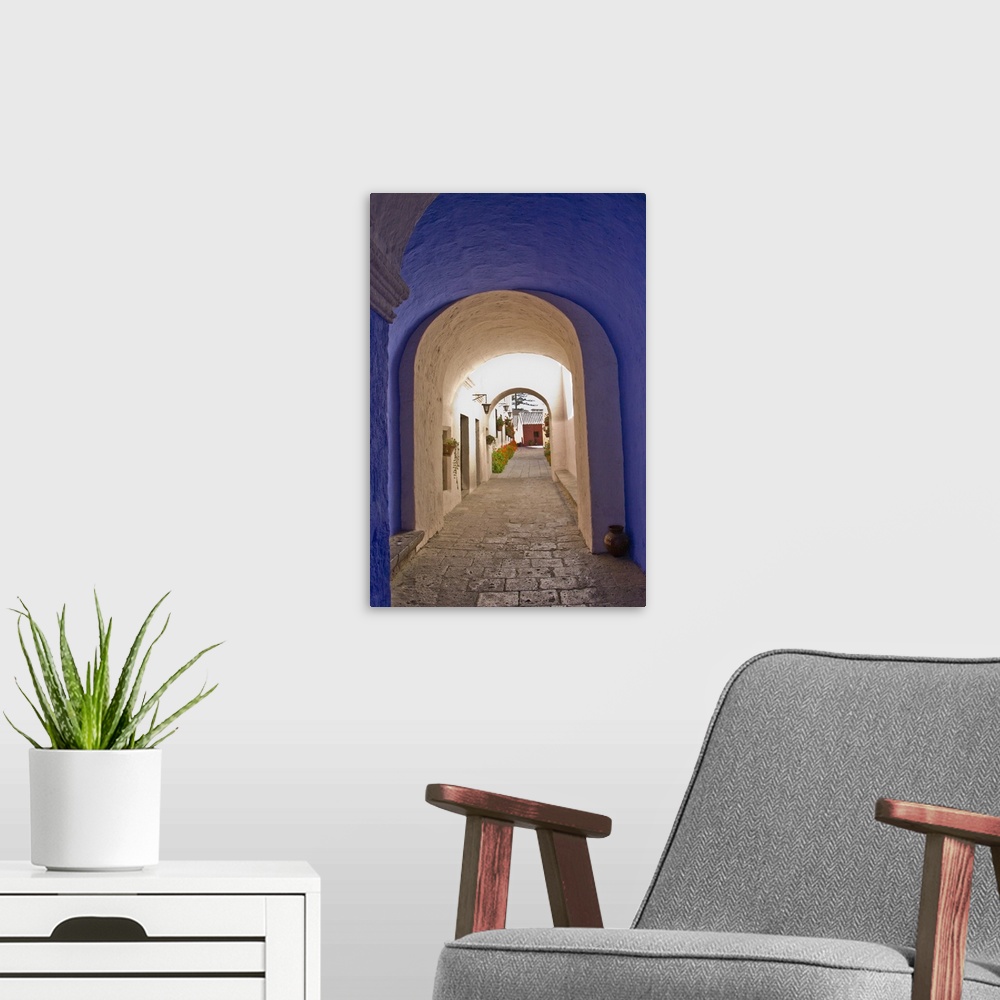 A modern room featuring Graceful archways of Monasterio Santa Catalina in the "White City" of Arequipa, Peru.