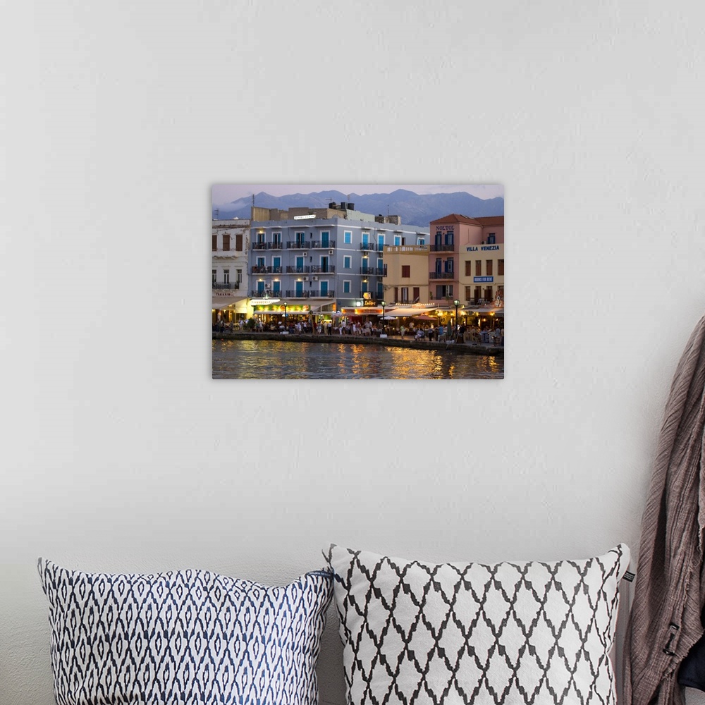 A bohemian room featuring Greek Island of Crete and old town of Chania evening light along the old harbor and the colorful ...