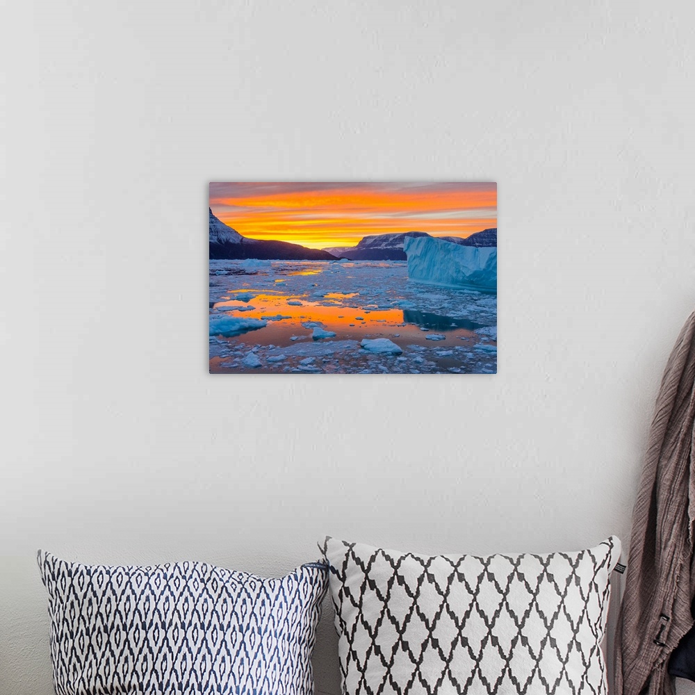 A bohemian room featuring Greenland, Scoresby Sund, Gasefjord. Sunset with icebergs and brash ice.