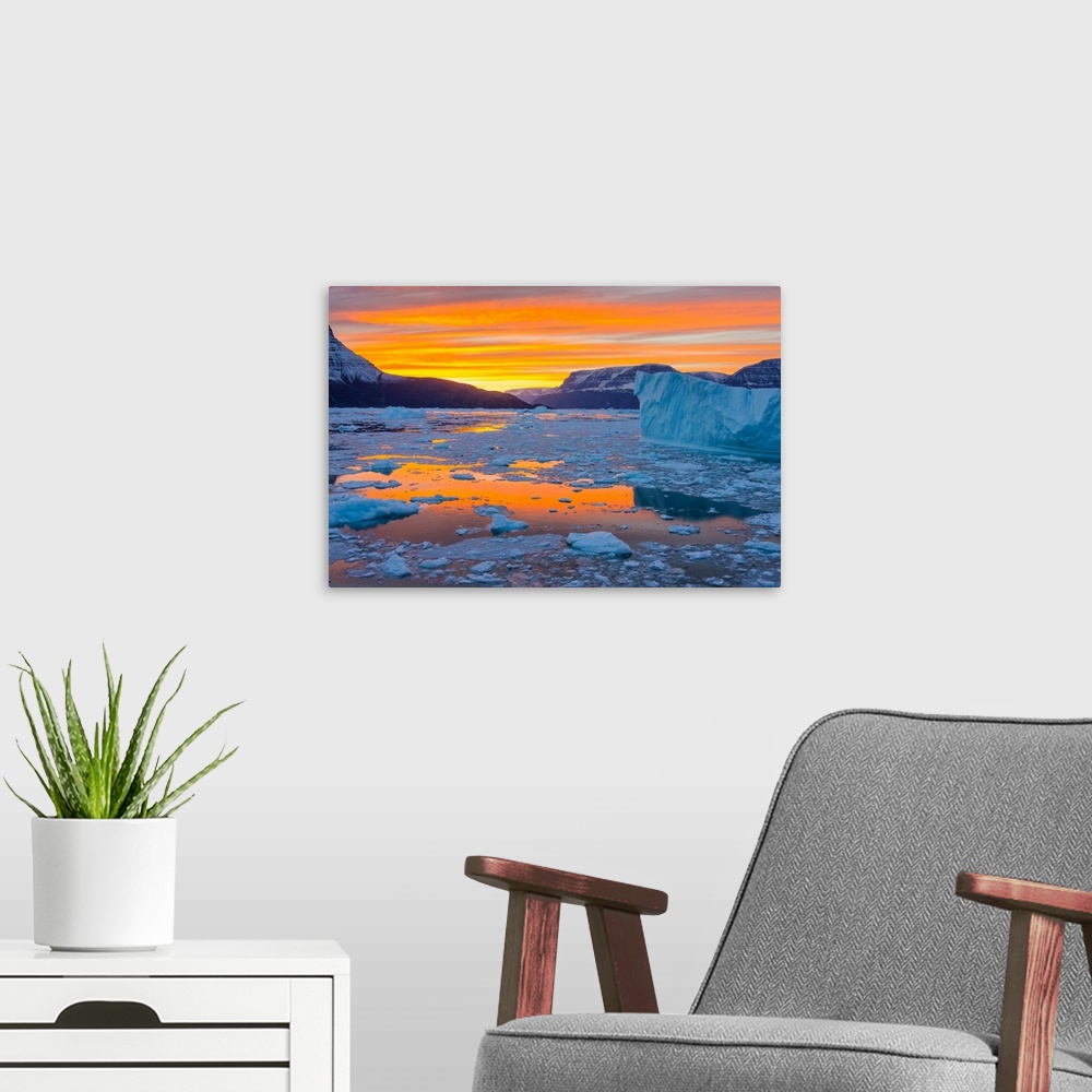 A modern room featuring Greenland, Scoresby Sund, Gasefjord. Sunset with icebergs and brash ice.