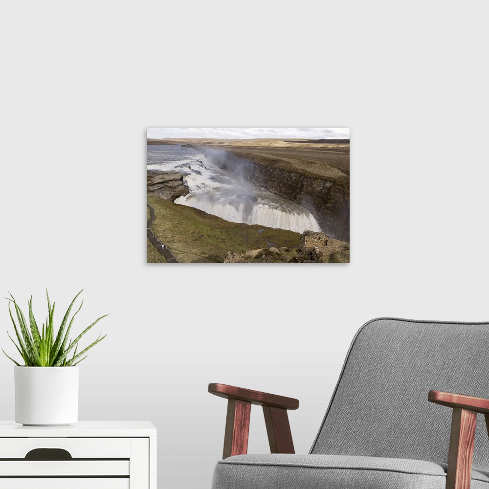 A modern room featuring Gullfoss waterfalls, Iceland.