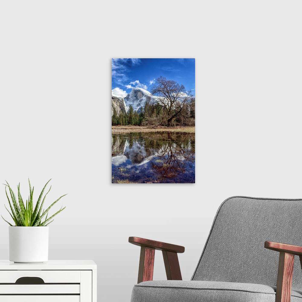 A modern room featuring Half Dome with reflections seen from Cooks Meadow. Yosemite National Park, California.
