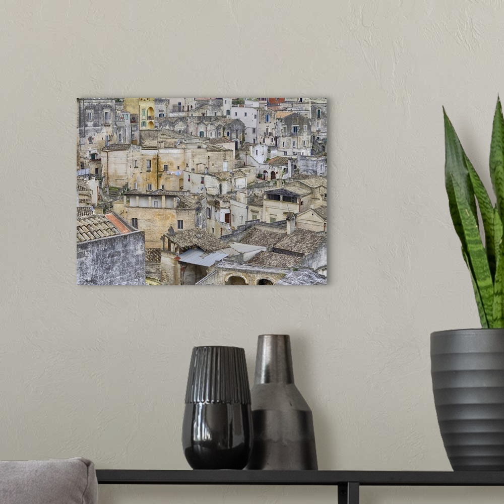 A modern room featuring Historic cave dwellings, called Sassi houses, in the village of Matera.