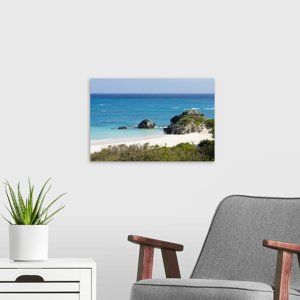 A modern room featuring Horseshoe Bay beach, Bermuda.