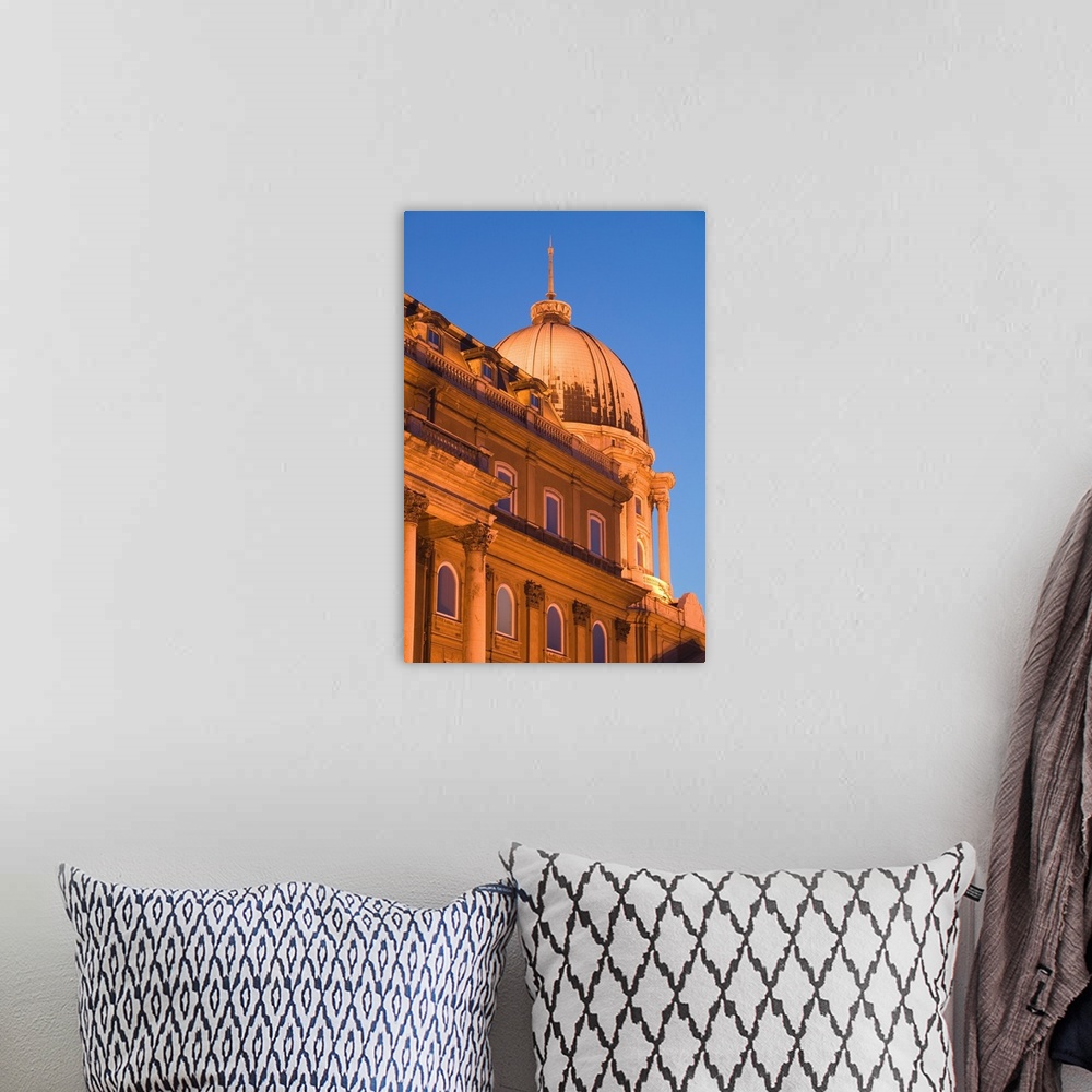 A bohemian room featuring HUNGARY-Budapest:.Buda / Castle Hill- .Dome of Ludwig Museum / Evening