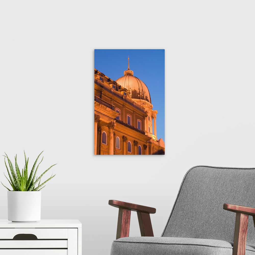 A modern room featuring HUNGARY-Budapest:.Buda / Castle Hill- .Dome of Ludwig Museum / Evening