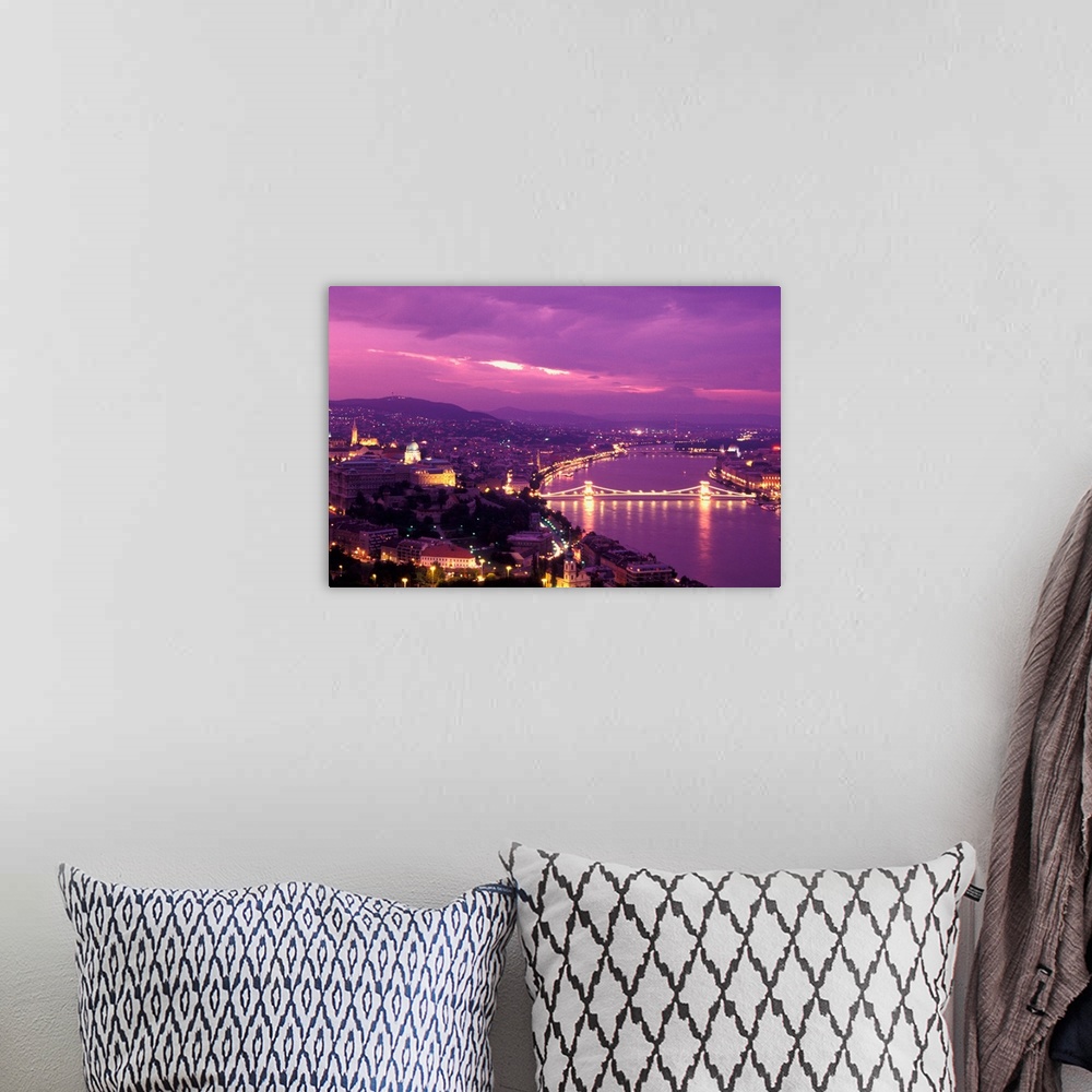 A bohemian room featuring Hungary, Budapest, City and Danube river at dusk.