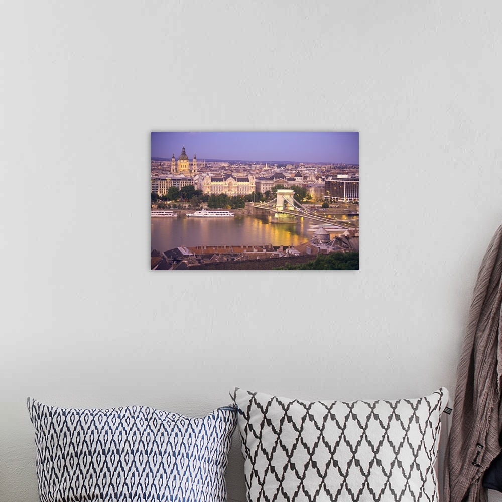 A bohemian room featuring HUNGARY, Budapest. View of the Sz..chenyi Chain Bridge and St. Stephen's Basilica from Castle Hill.