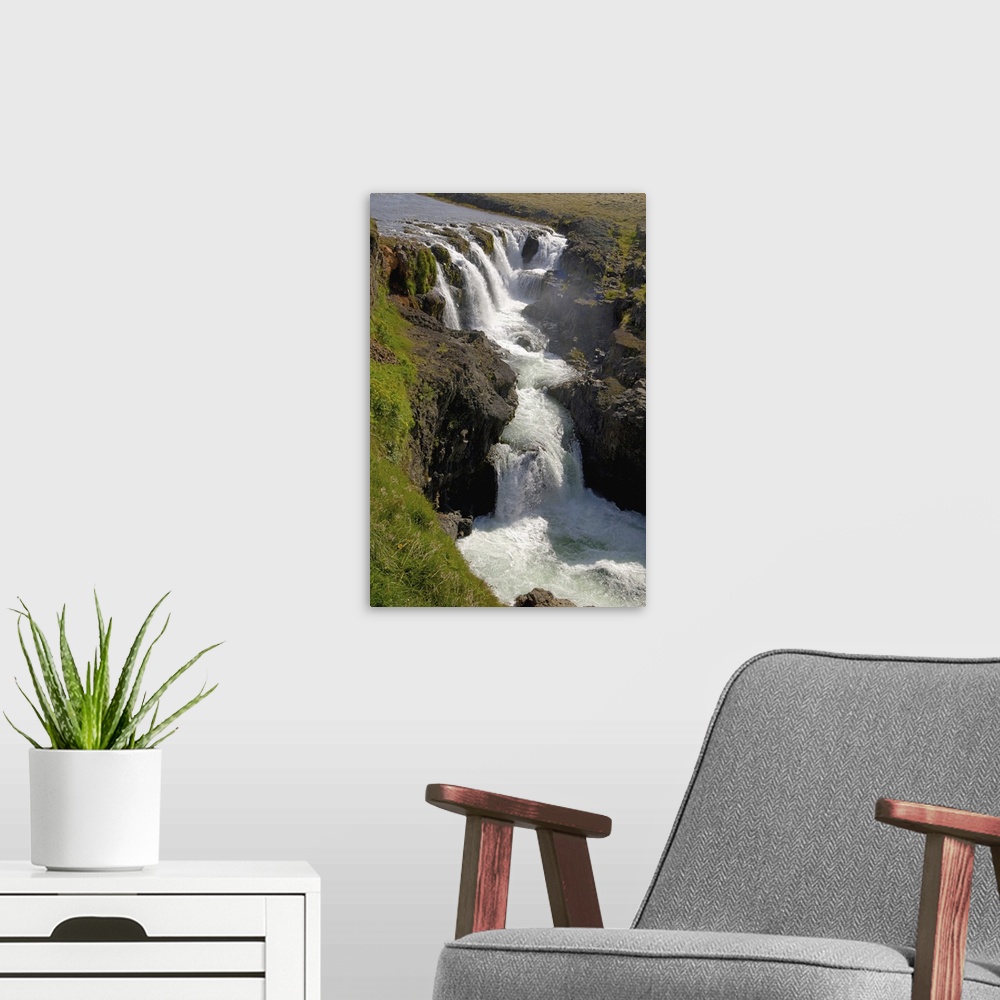 A modern room featuring Iceland, Kolugljufur waterfall and canyon