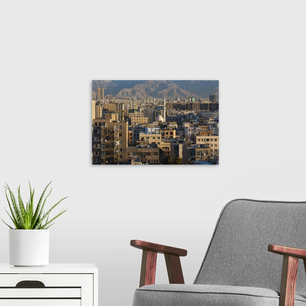 A modern room featuring Iran, Tehran, elevated city view with mosque, dawn