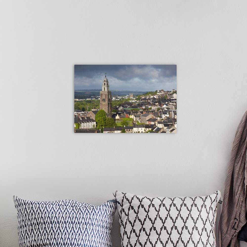 A bohemian room featuring Ireland, County Cork, Cork City, elevated city view with St. Anne's Church, dawn.