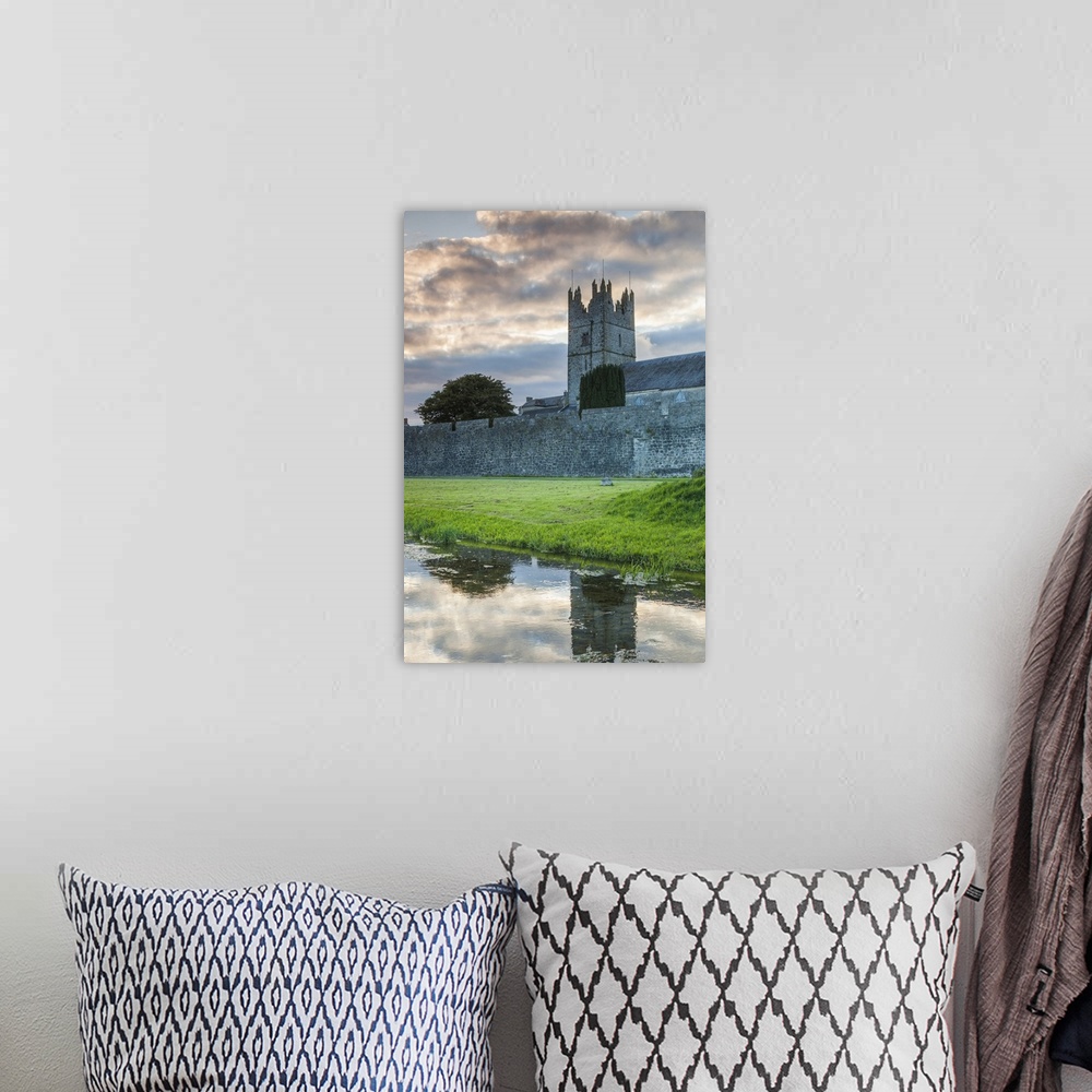A bohemian room featuring Ireland, County Tipperary, Fethard, town walls, dusk.