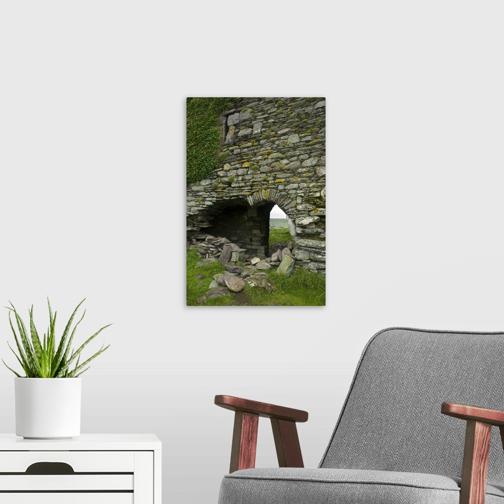 A modern room featuring IRELAND, Kerry, Ring of Kerry. Ballycarberry Castle, near Cahersiveen. Ruined archway.