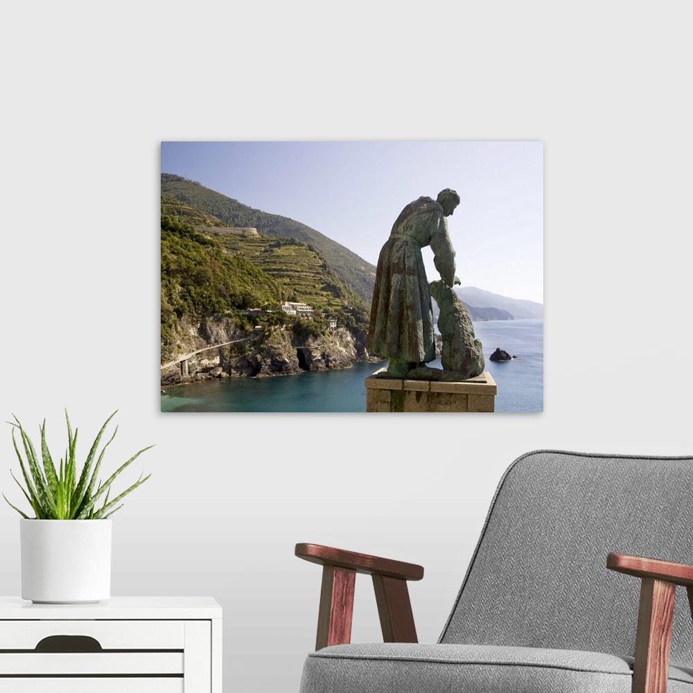 A modern room featuring Europe, Italy, Cinque Terre, Monterosso. A statue of St. Francis of Assisi petting a dog and look...