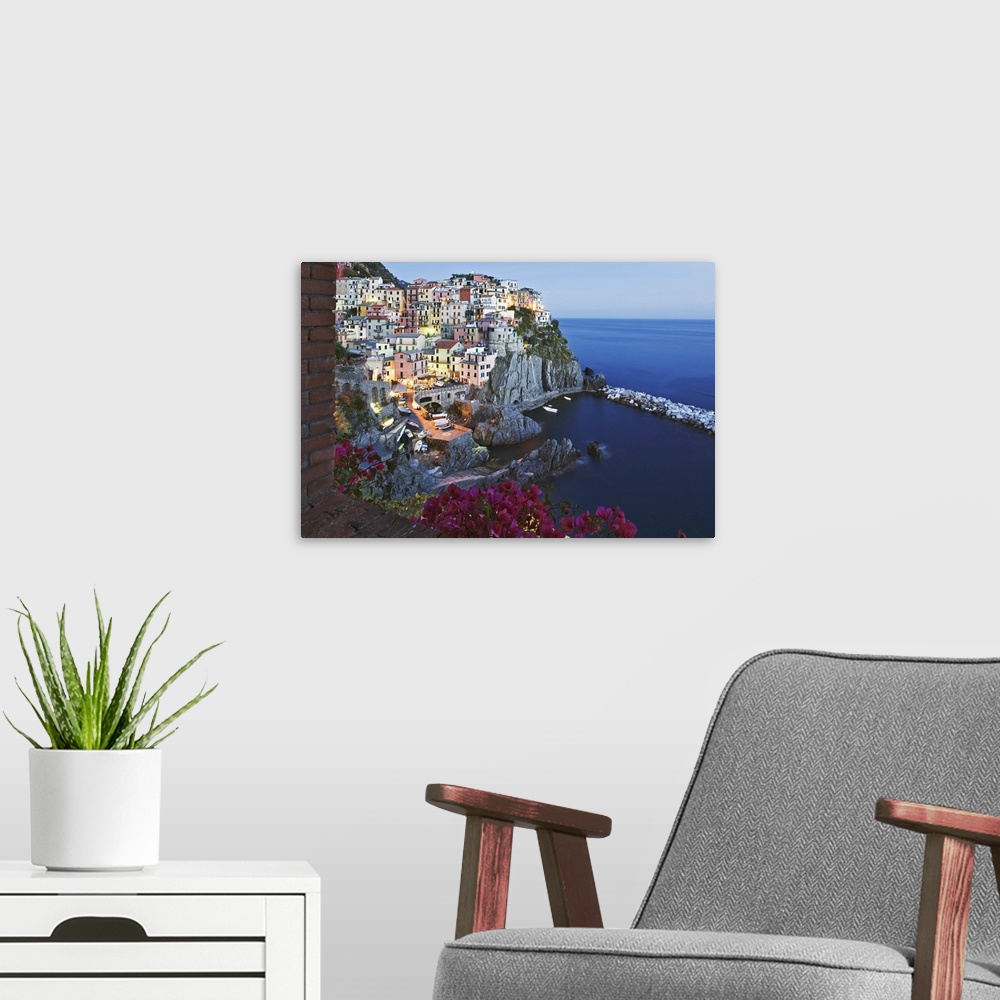 A modern room featuring Europe, Italy, Cinque Terre, Manarola. Dusk on a scenic coastline town.