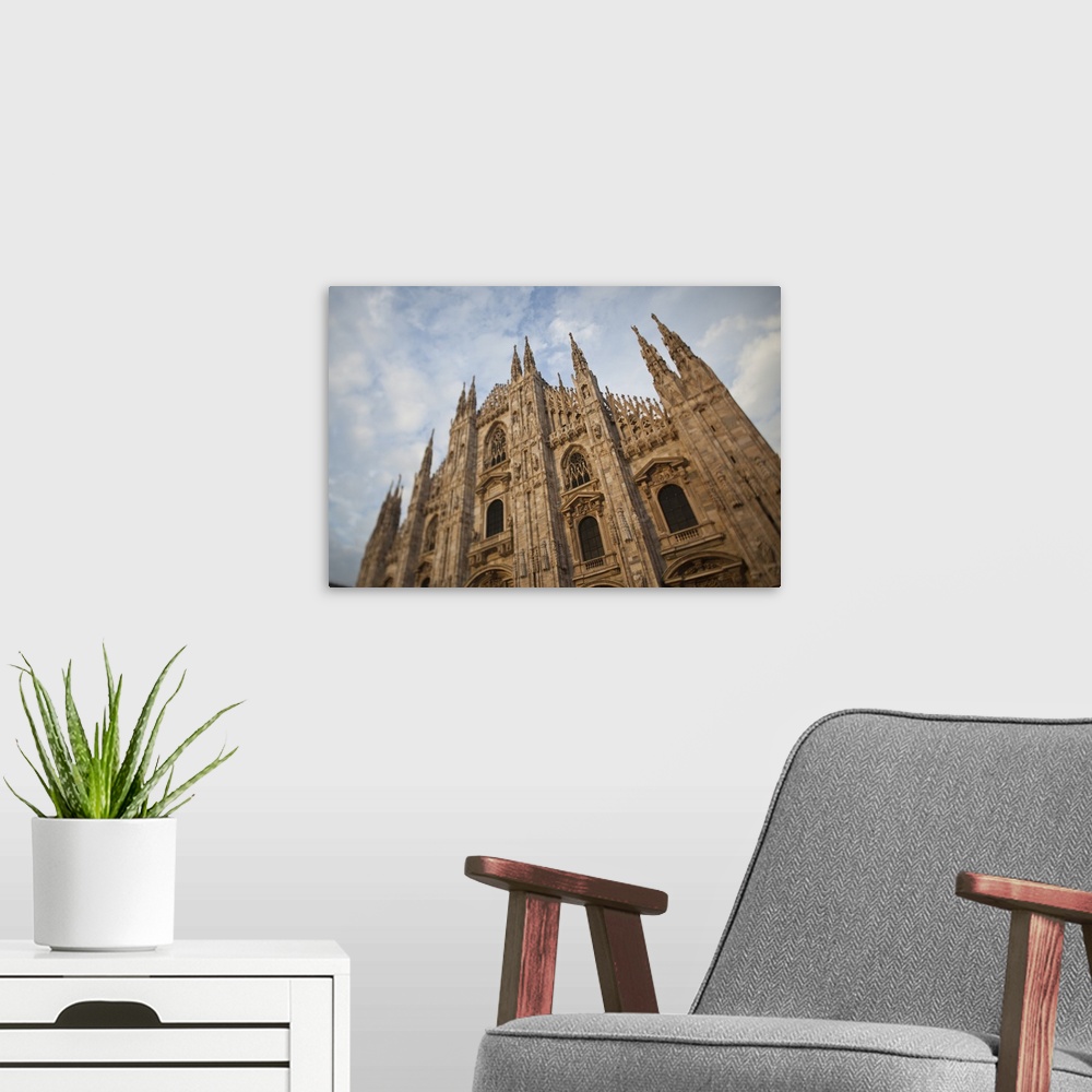 A modern room featuring ITALY, Milan Province, Milan. Milan Cathedral, evening.
