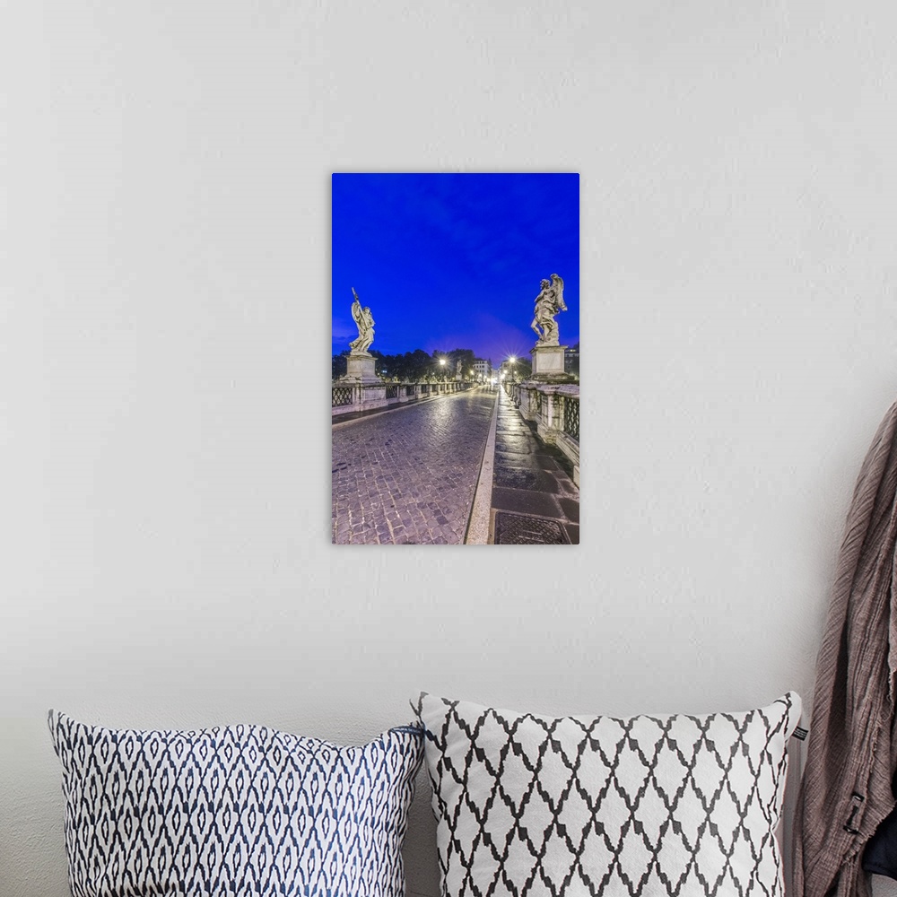 A bohemian room featuring Italy, Rome, Ponte Sant'Angelo at Dawn, Also called St. Peter's Bridge.