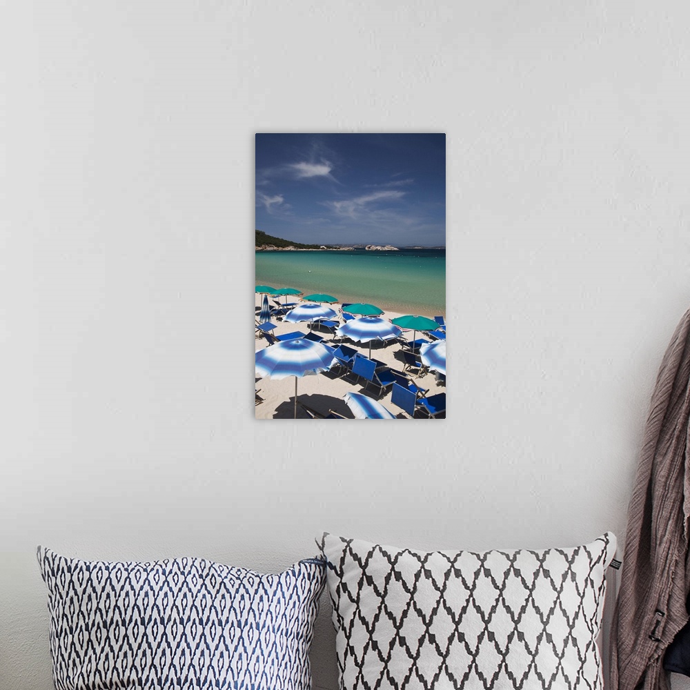 A bohemian room featuring ITALY, Sardinia, Baja Sardinia. Resort beach.