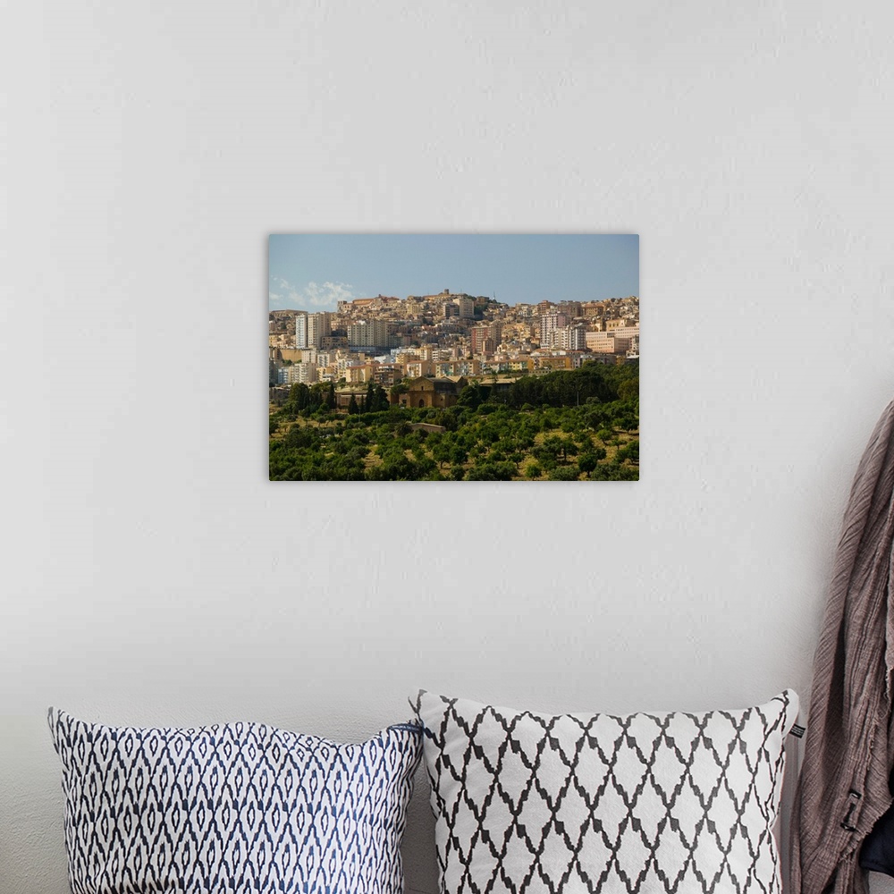 A bohemian room featuring Italy, Sicily, Agrigento, La Valle dei Templi, Valley of the Temples, View of Modern AGRIGENTO
