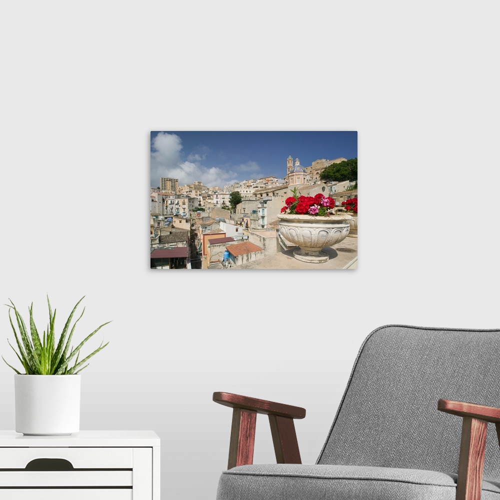 A modern room featuring ITALY-Sicily-TERMINI IMERESE:.Town View from Flowered Balcony... Walter Bibikow 2005