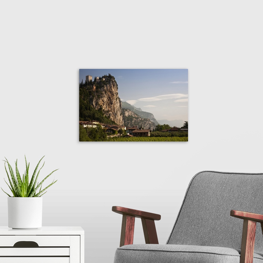 A modern room featuring Italy, Trento Province, Arco. Mountaintop Castello di Arco, view from Sarca River, morning.