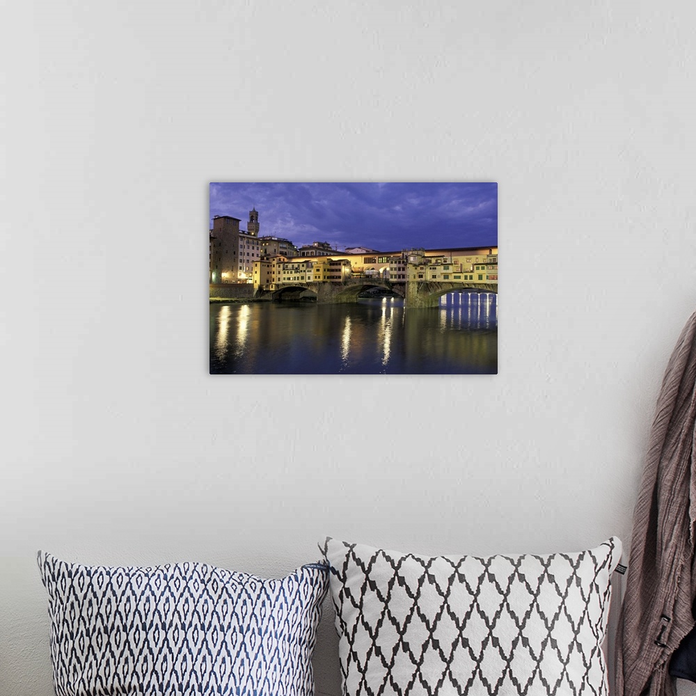 A bohemian room featuring Europe, Italy, Tuscany, Florence. Evening view of Ponte Vecchio from Arno River