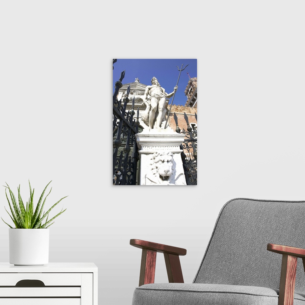A modern room featuring Europe, Italy, Venice. Statue of Neptune in front of the Arsenal.