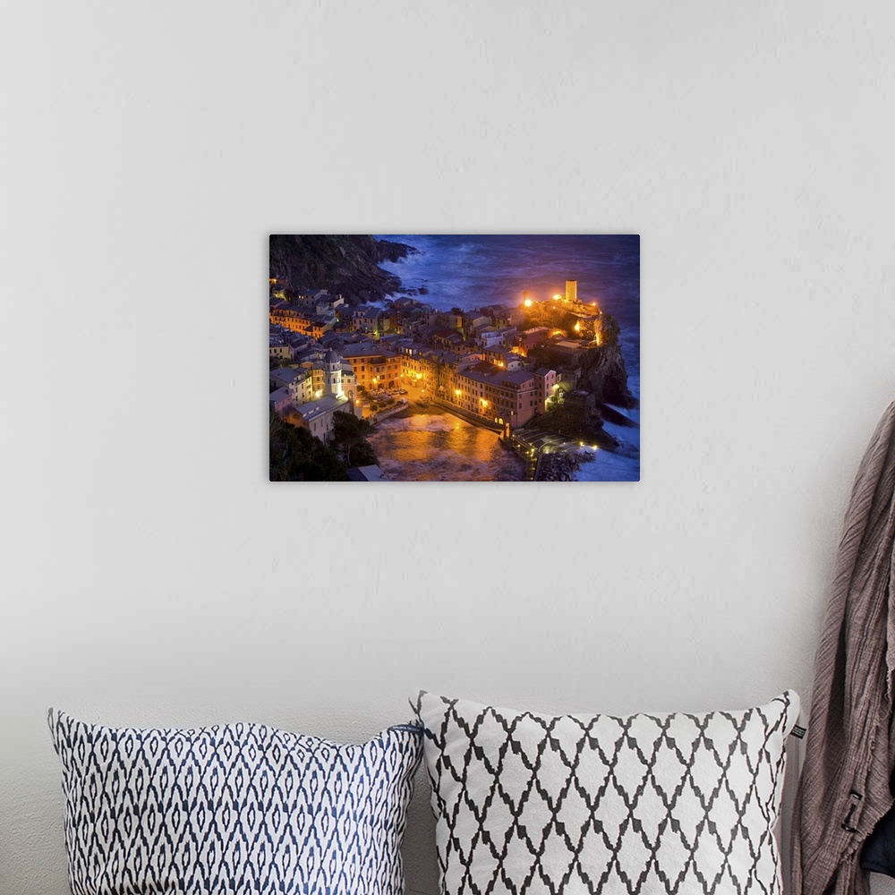 A bohemian room featuring Europe, Italy, Vernazza, Cinque Terra. Overview of city lit at night.
